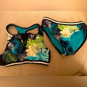 Girls size 7/8 bikini swimsuit. Like new. Blue and teal floral pattern.